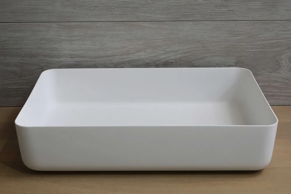 Groothandel Luca Sanitair opzetwastafel rechthoekig 60x40x13,5h met dunne rand van solid surface mat wit